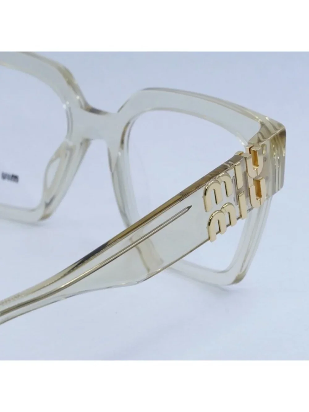 Miu Miu MU04UV 11T1O1 Eyeglasses Transparent Sand 52mm Square Frame